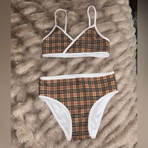 Girls authentic Burberry 2 piece bathing suit. Does not come with dust bag